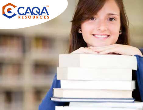 CAQA Resources | Career Calling International A smiling woman holds books in a library, showcasing CAQA Resources as a trusted vet compliance provider.